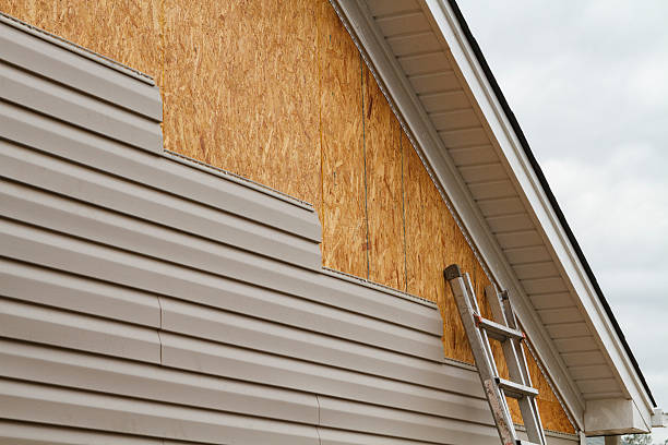 Professional Siding Contractor technician working in Wellsville, OH